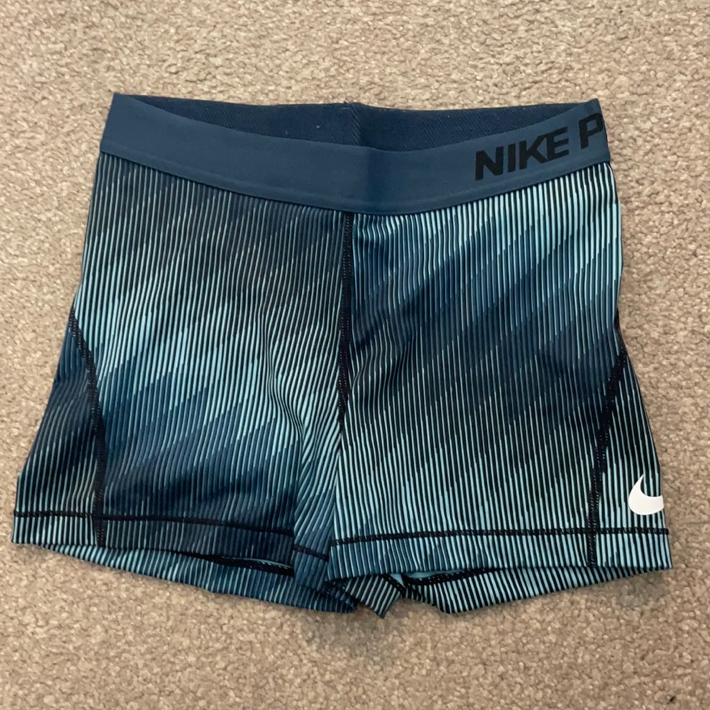 Blue patterned nike pros